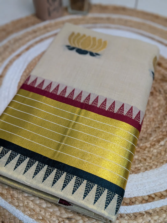Ponnonam – Kerala Saree with Lotus Weaving & Dual Temple Borders