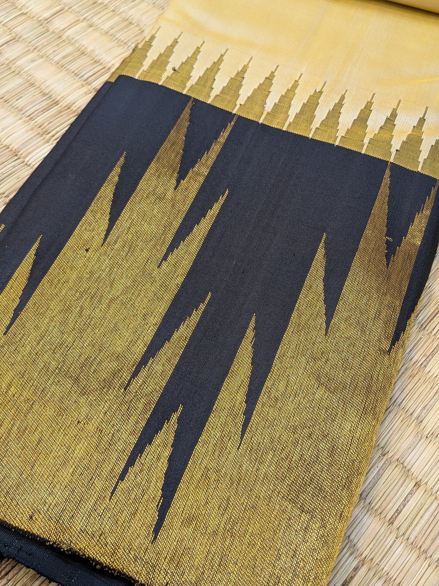 Taarakai - Pure Handloom Off-White Saree with Black & Gold Temple Borders
