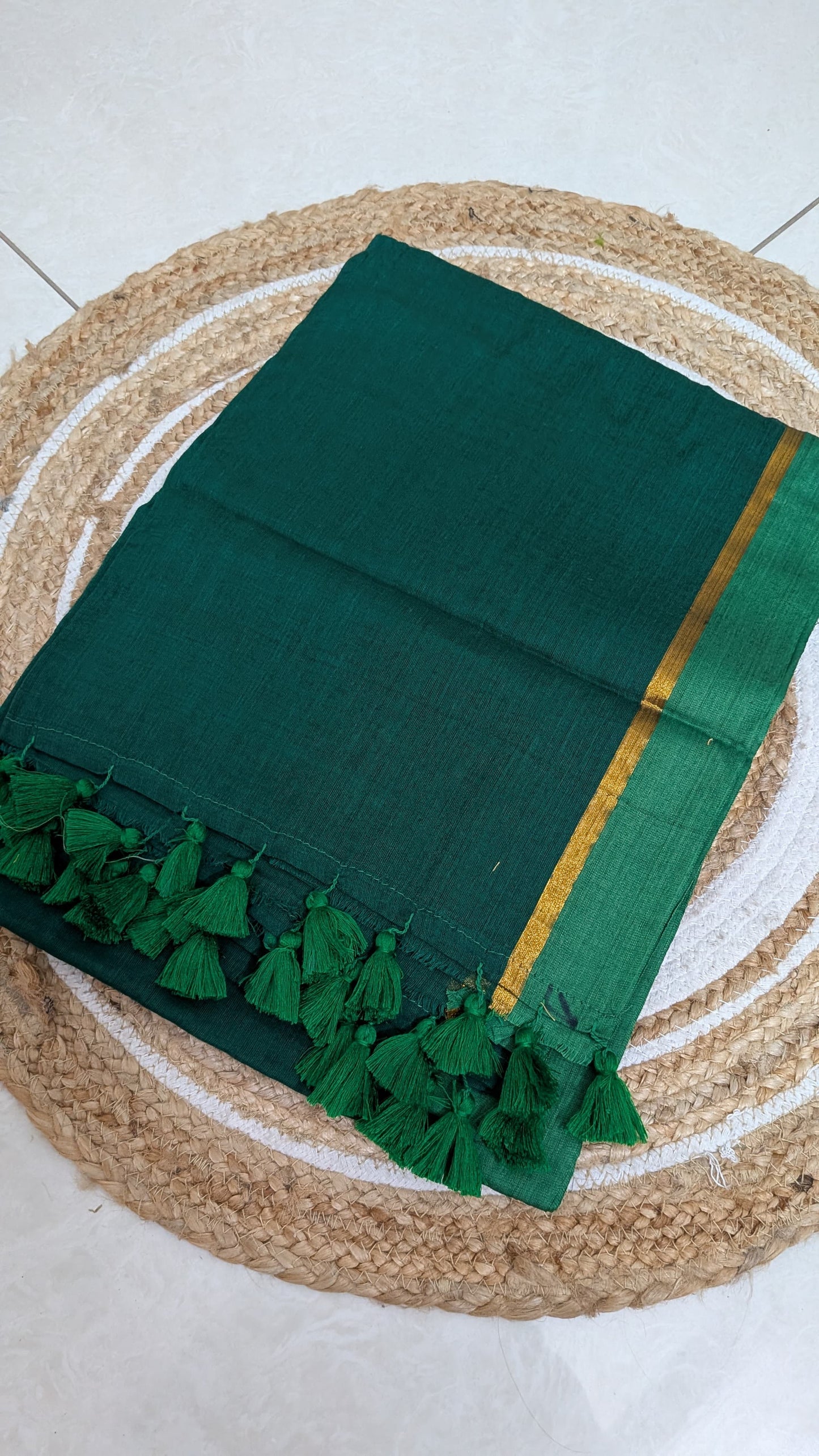 Mridula - Green Mulmul saree with thin golden border