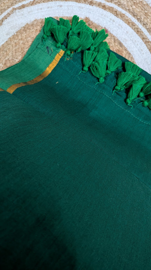 Mridula - Green Mulmul saree with thin golden border