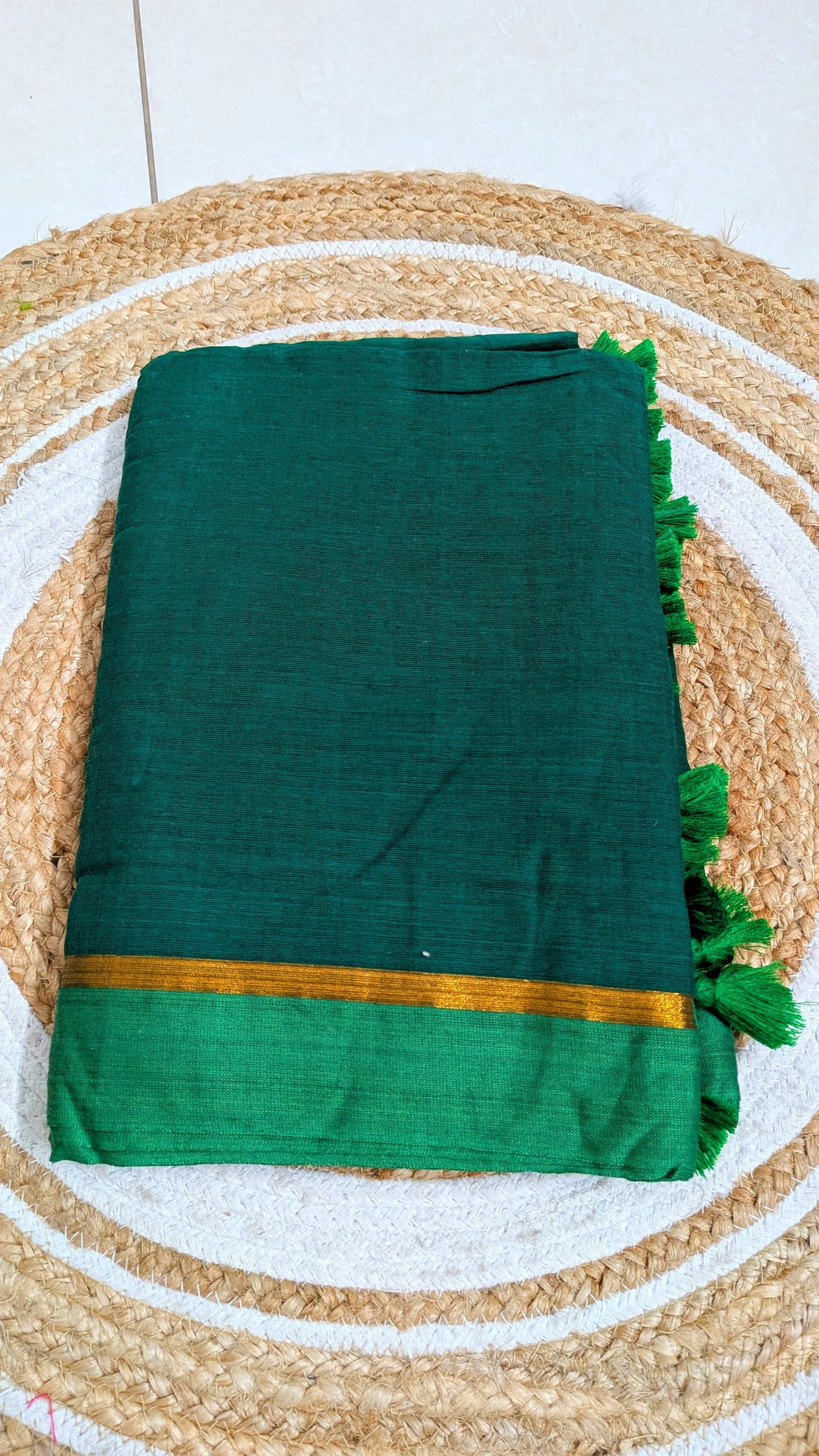 Mridula - Green Mulmul saree with thin golden border