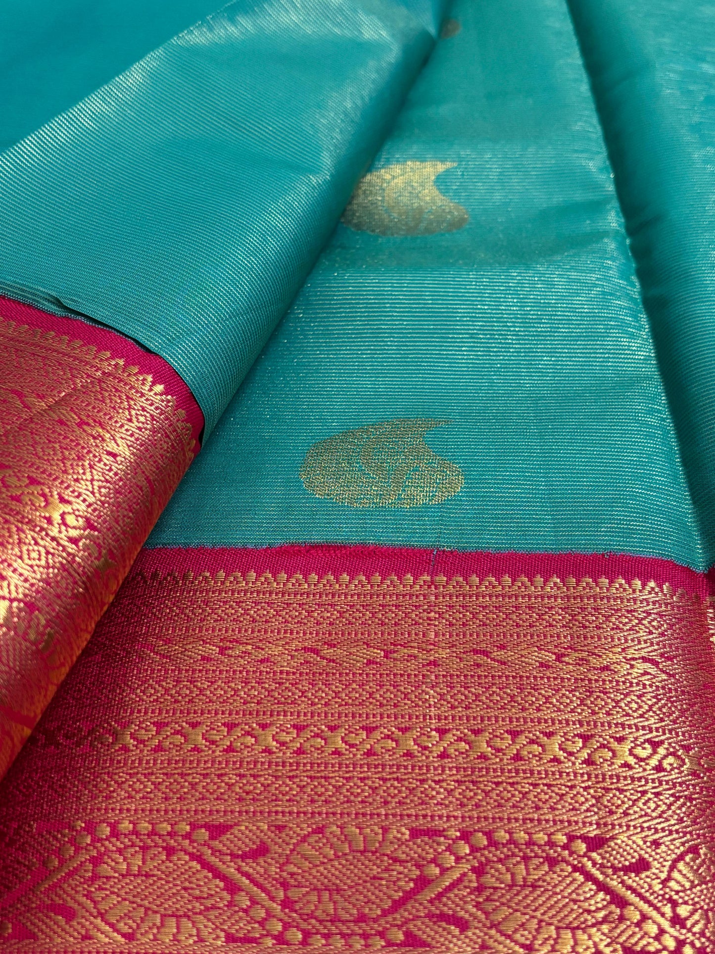 Nayika – Semi Silk Kanchipuram Saree in Green with Vibrant Pink and Gold Zari