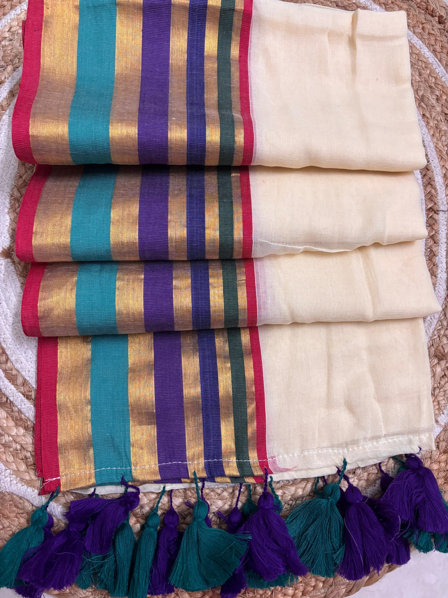 Mridula - Offwhite Mulmul saree with multicoloured Kara-Kasavu Border