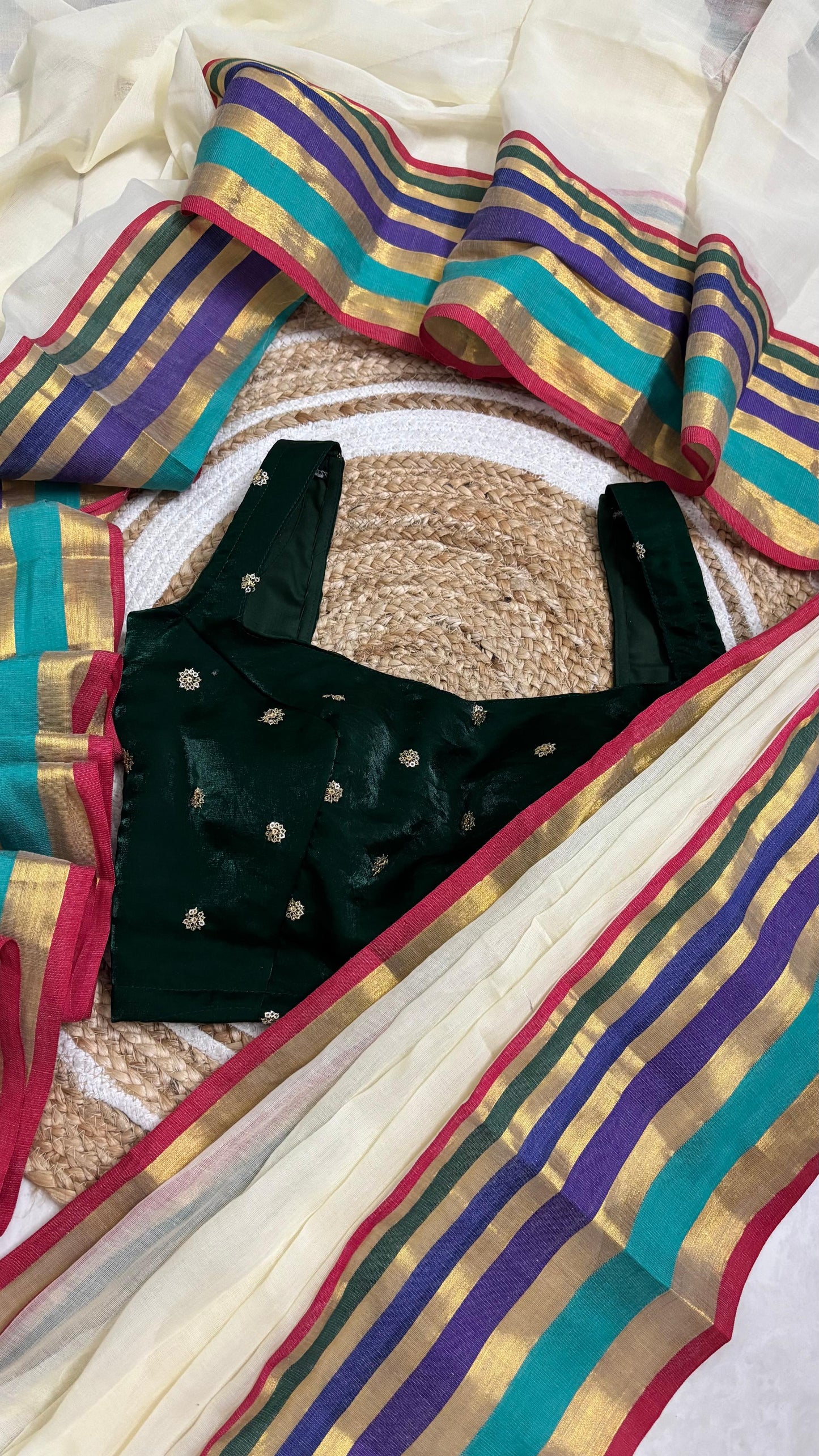 Mridula - Offwhite Mulmul saree with multicoloured Kara-Kasavu Border