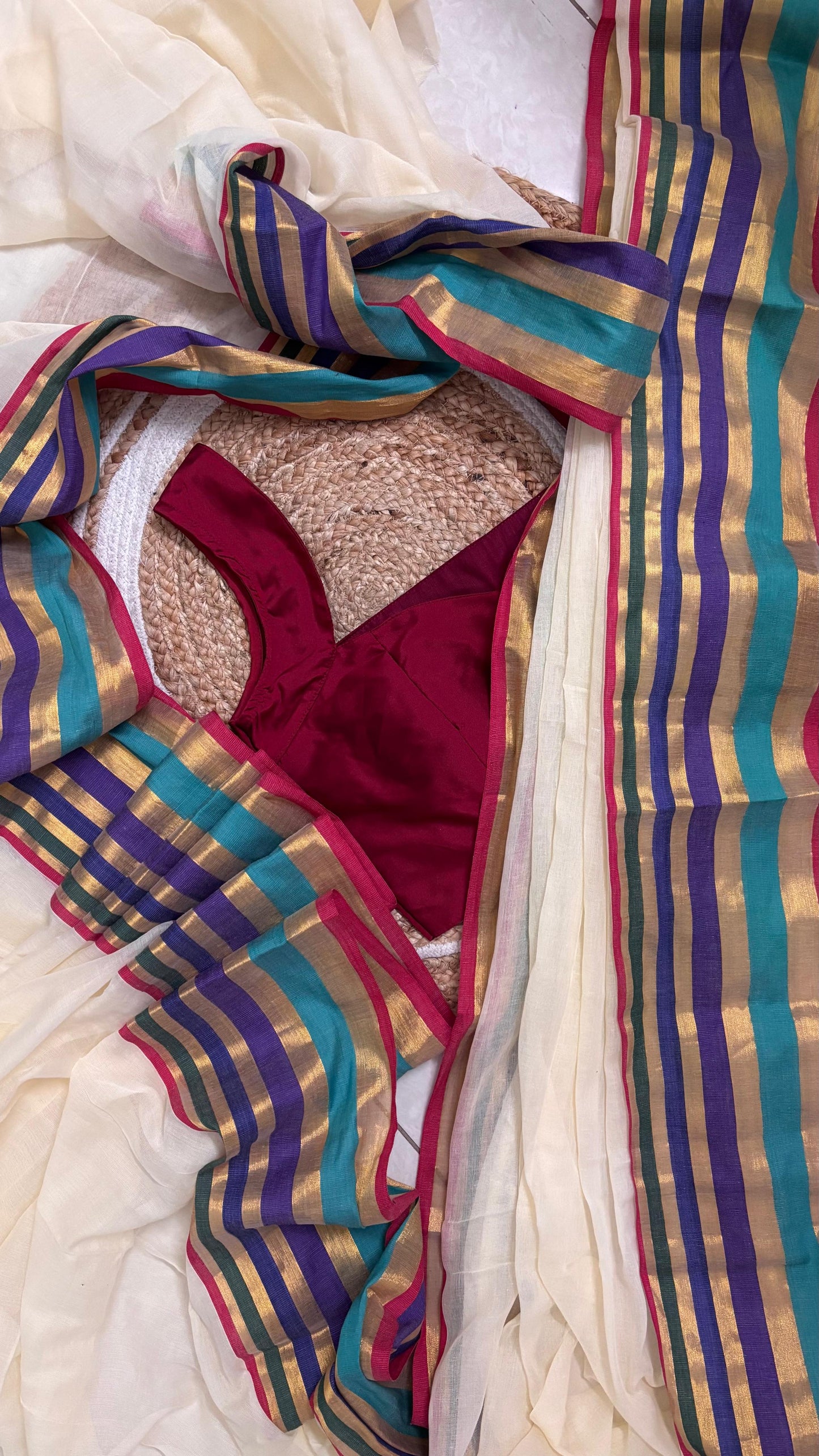 Mridula - Offwhite Mulmul saree with multicoloured Kara-Kasavu Border