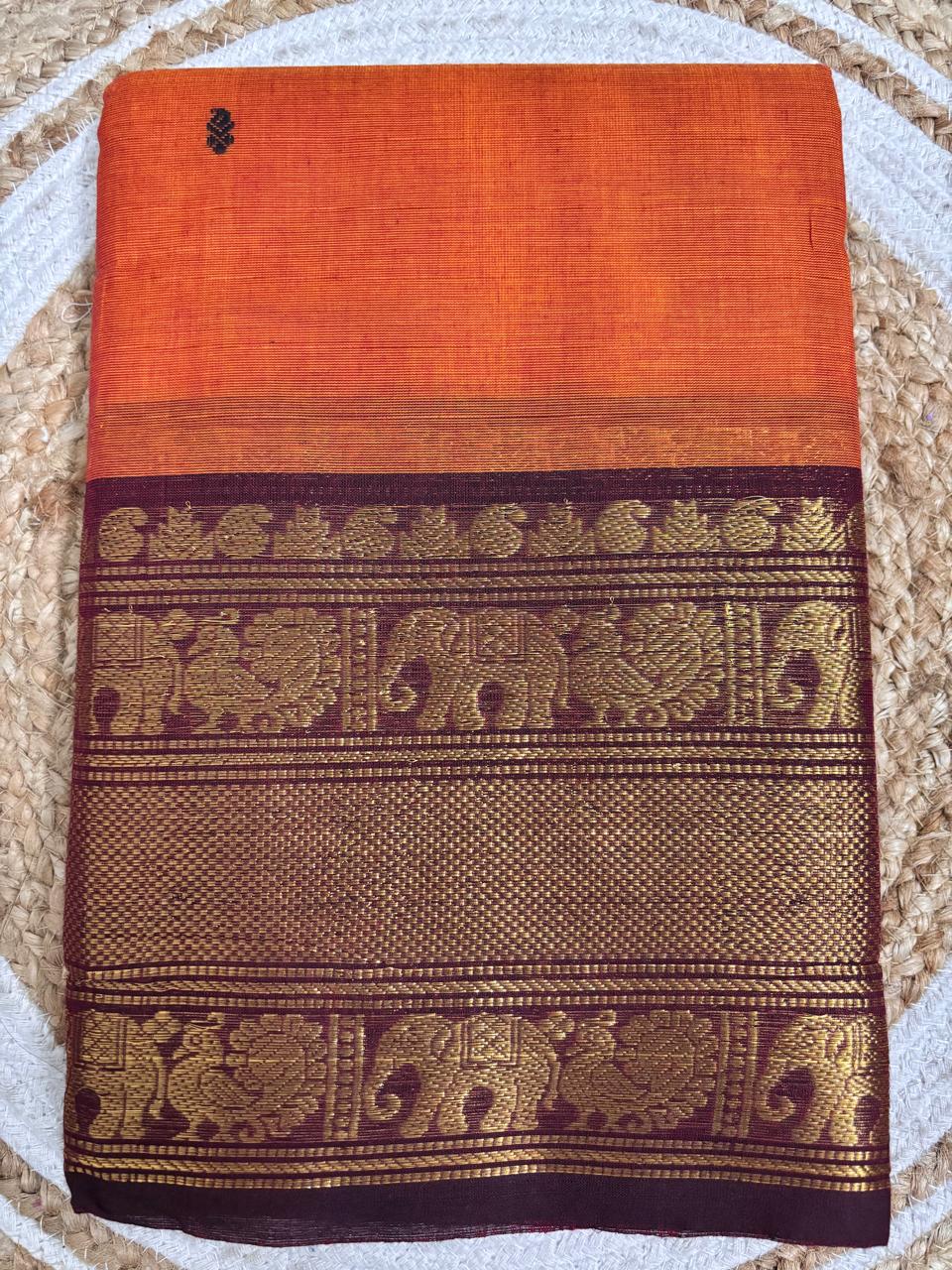 Nira - Burnt Orange Kanchi Cotton Saree with Brown Border & Motifs