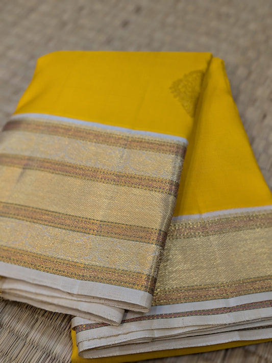 Taarakai – Pure Kanchipuram Silk Handloom Saree in Yellow with Off-White Korvai Border
