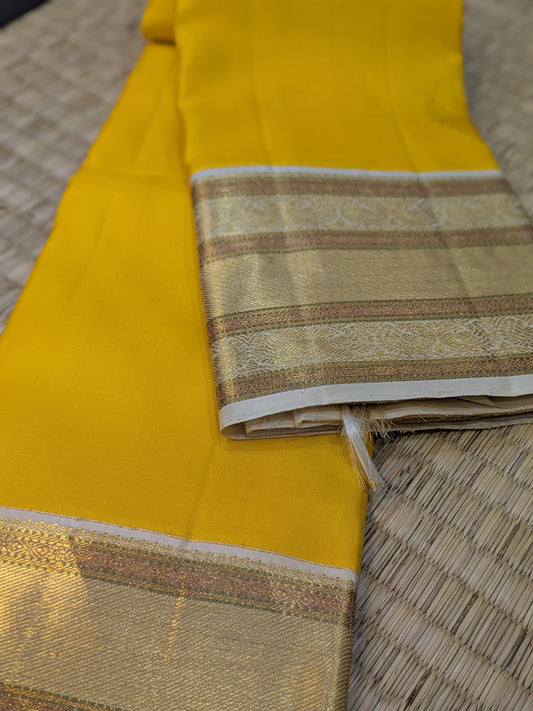 Taarakai – Pure Kanchipuram Silk Handloom Saree in Yellow with Off-White Korvai Border