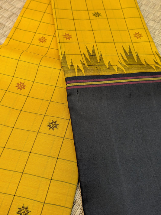 Taarakai – Pure Kanchipuram Handloom Saree in Yellow Checks with Black Long Border (No Zari)
