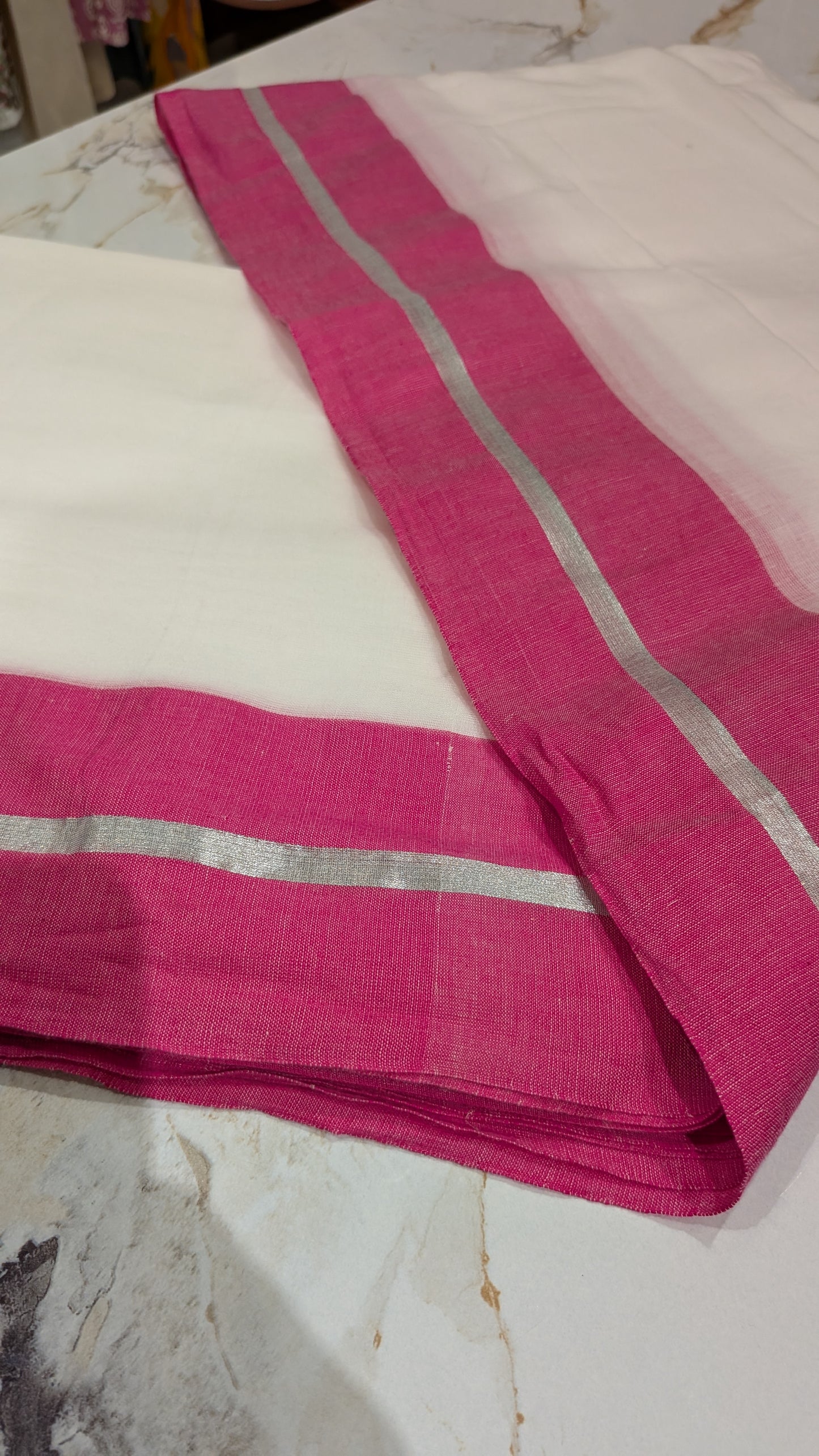 Mridula - Pink and Silver Border white Mulmul saree