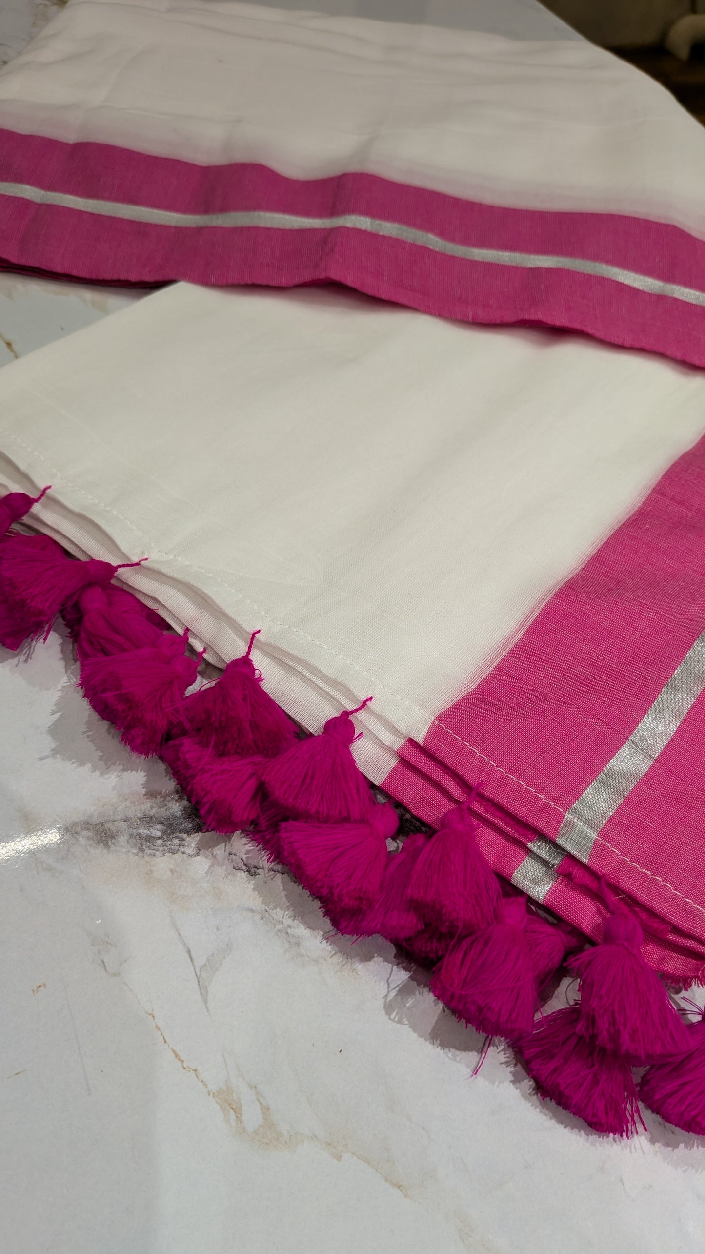 Mridula - Pink and Silver Border white Mulmul saree
