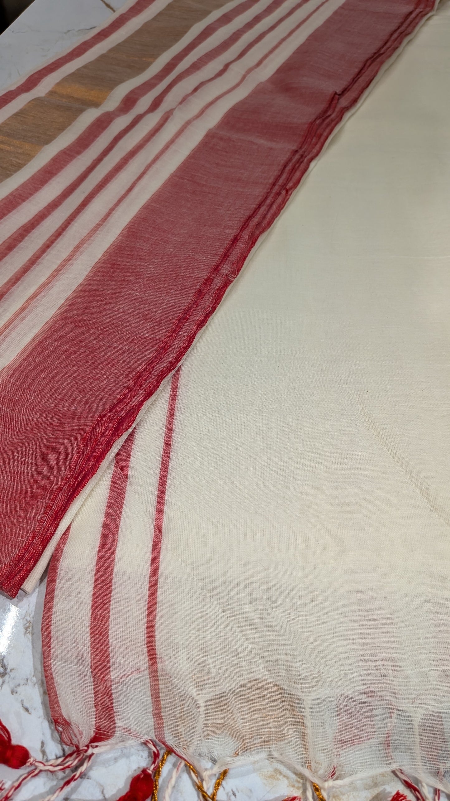 Mridula- Red Stripes Border White Mulmul saree