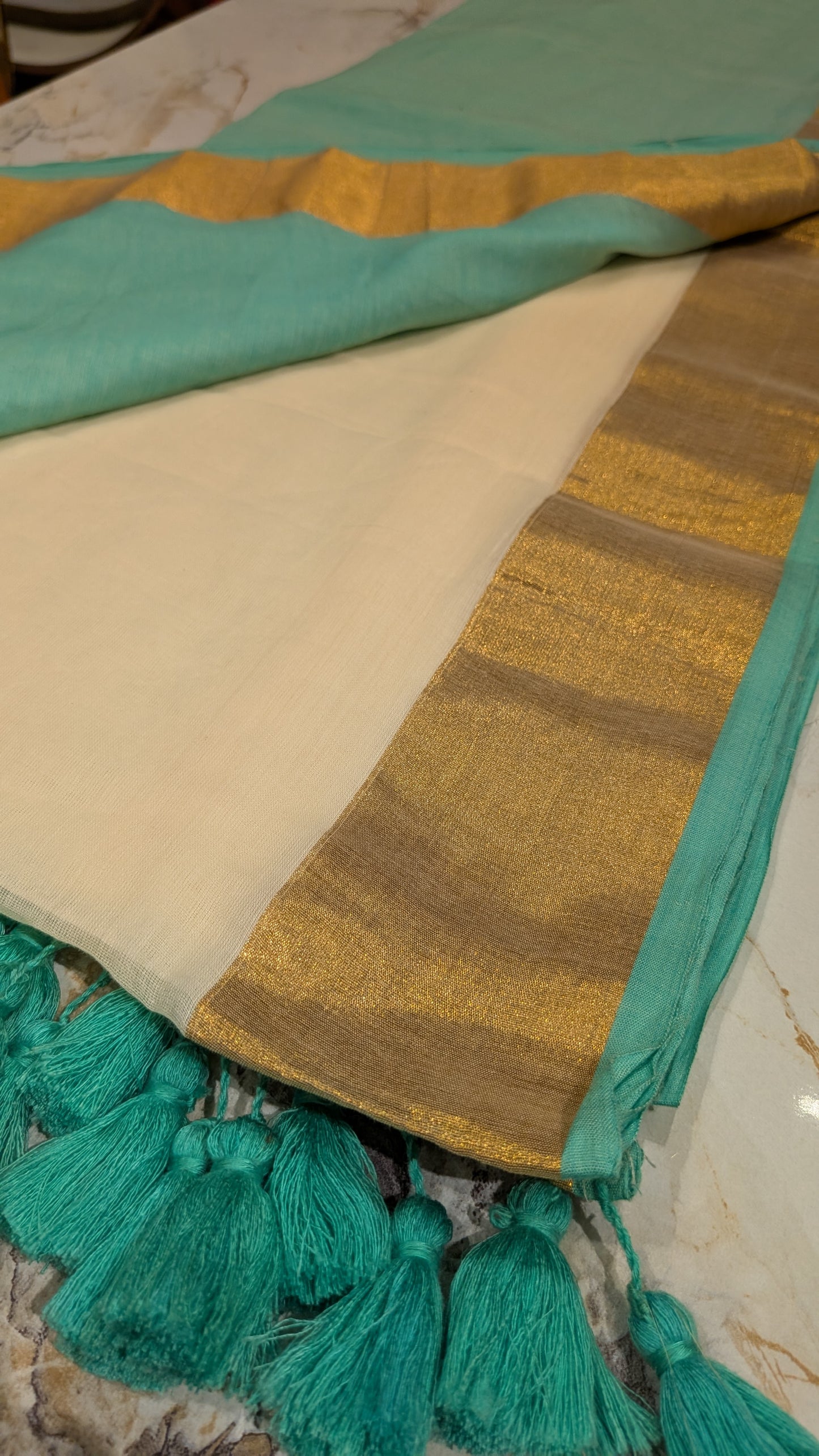 Mridula -Green & Off-White Mul Mul Cotton Kasavu Saree